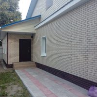 отделка сайдингом под кирпич